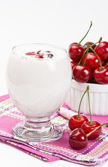 Obraz na płótnie Canvas Yogurt and sweet cherry