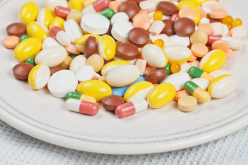 Plate filled with medicine pills and capsules