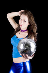 Young woman with disco ball