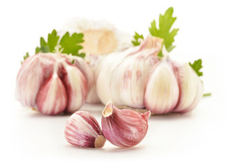 Fresh garlic with parsley isolated on white