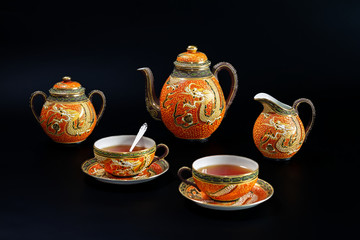 Antique Chinese tea set with dragon motif