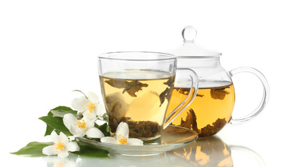 green tea with jasmine in cup and teapot isolated on white