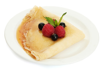 Delicious pancake with berries and honey