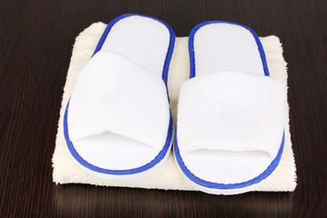 slippers on wooden background