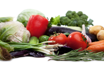 Fresh vegetables on white.