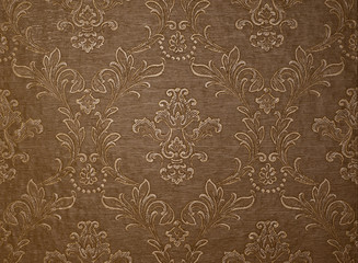brown wallpaper with floral motives background