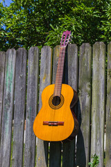 Guitar and the old wagon wheel