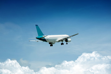 Airplane on blue sky