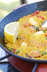 Spanish paella with seafood in a pan
