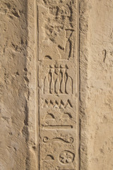 Old egypt hieroglyphs carved on the stone