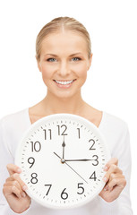 woman holding big clock