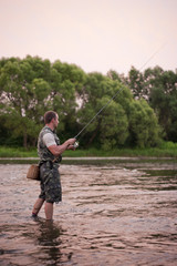 An angler fishing for some big freshawater chub