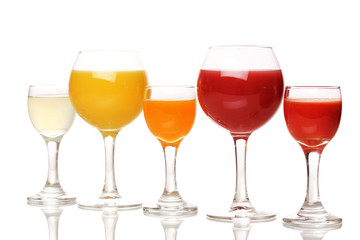Tropical juices in glasses isolated on white