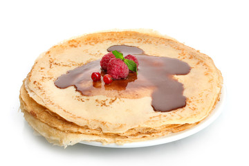 Delicious pancakes with berries and chocolate