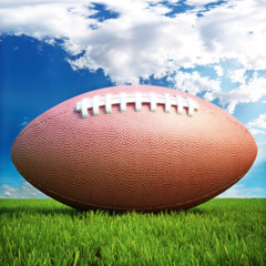 American football on a grass, from for text or copyspace