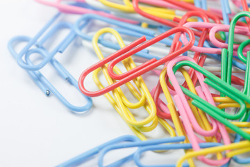 a colorful paper clip on white background