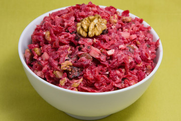 Salad with beets, dried plums, nuts