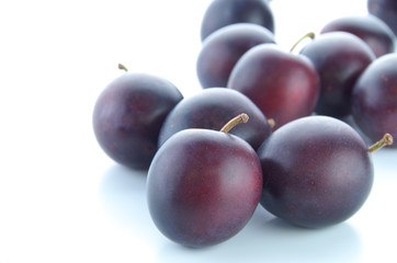 Prunes on white background