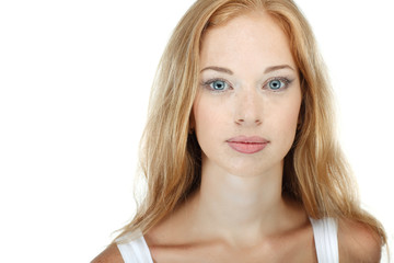 Fototapeta premium Portrait of redheaded young woman with beautiful blue eyes 