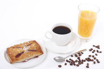 coffee and orange juice with raspberry bun