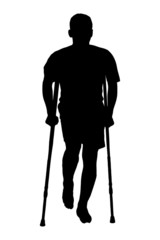 A silhouette of an injured man on crutches