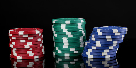 Casino chips isolated on black