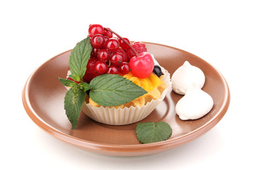 Dulcet cake with fruit and berries isolated on white