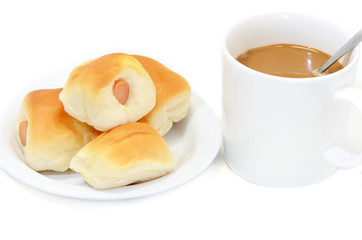 Sausage dough and coffee cup