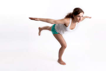 Fototapeta premium Junge Frau macht Gymnastik