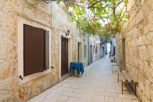 Fototapeta Small street in Pag, Croatia