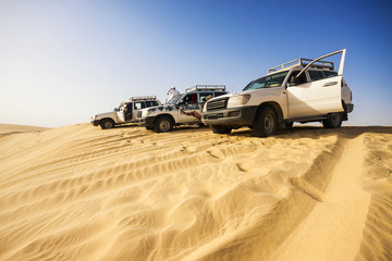 4x4 vehicles on a dune in the Sahara Desert, Tunisia