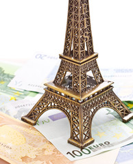 Eiffel tower model with Euro banknotes