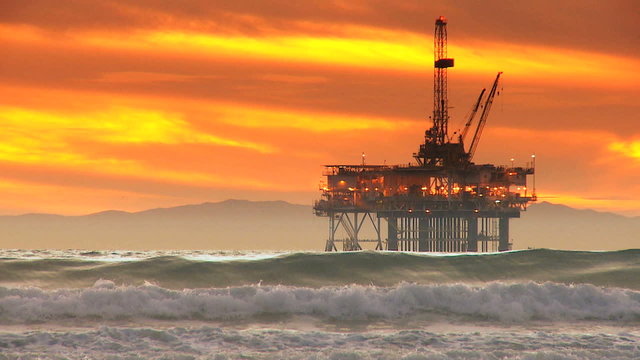 Coastal Oil Rig Sunset 