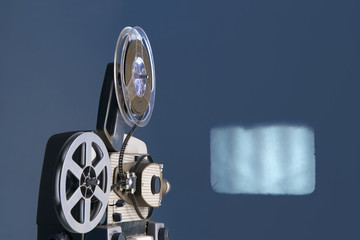 8mm movie projector with screen