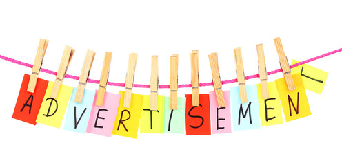 Colorful word hang on rope by wooden peg isolated on white