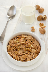 cereals with walnut in the white bowl