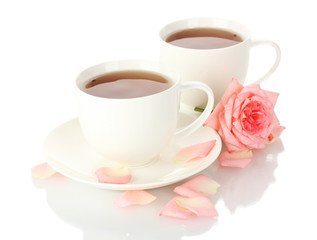 Fototapeta premium cups of tea with rose isolated on white