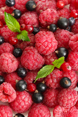 ripe berries with mint, close up.