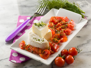 tomino cheese with pachino tomatoes salad