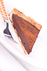 a slice of chocolate tart