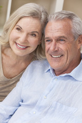 Happy Senior Man & Woman Couple Smiling at Home