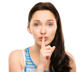 Fototapeta premium closeup portrait of woman with finger on lips pretty isolated on