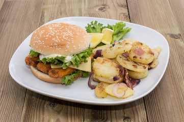 Fish Burger with fried Potatoes