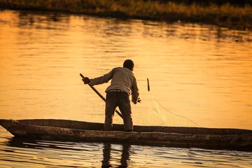 Fotobehang Man fishing © Jandrie Lombard