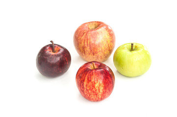 four colour apples on white