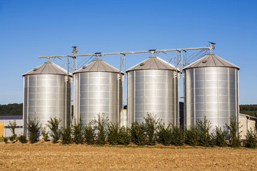 field in harvest with silo © travelview