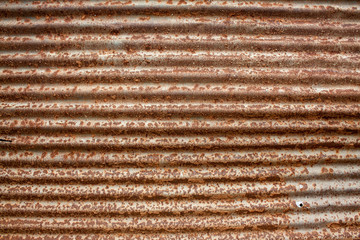 Background image of multi toned rustic corrugated metal