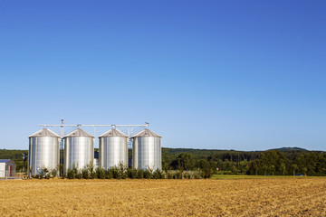 field in harvest with silo © travelview