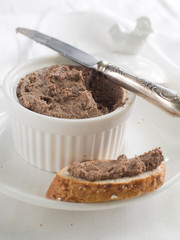 Chicken liver pate in ramekin, selective focus