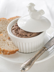 Chicken liver pate in ramekin, selective focus